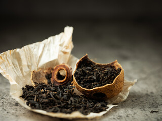 Paper wrapped tangerine puer tea