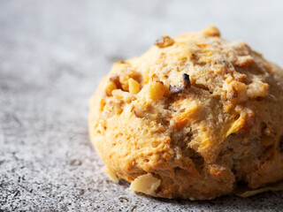 Homemade vegetable scones on vintage background