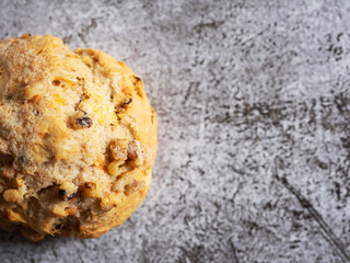 Homemade vegetable scones on vintage background
