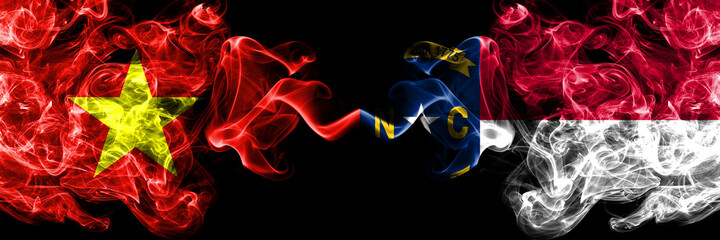 Vietnam, Vietnamese vs North Carolina smoke flags side by side.