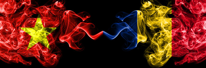 Fototapeta premium Vietnam, Vietnamese vs Romania, Romanian smoke flags side by side.