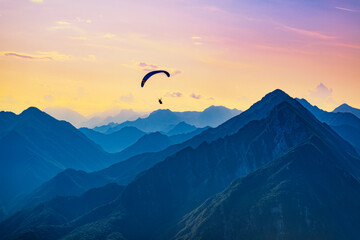 Sunset dream flight in the mountains.