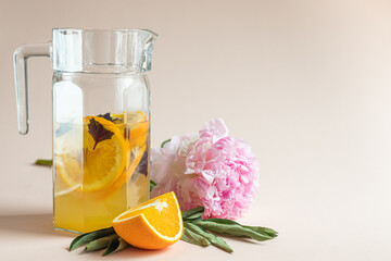 peony orange juice lemonade with basil leaves
