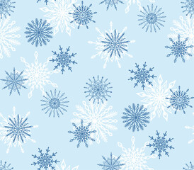 Seamless pattern with blue and wite hand drawn snowflake icons on light blue backdrop. Winter Christmas festive background, snow texture