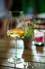 white wine on the wooden table