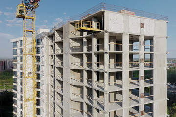 Aerial view of high residential apartment building under construction