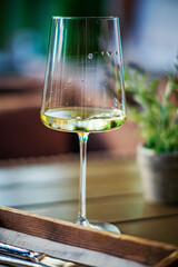 white wine on the wooden table