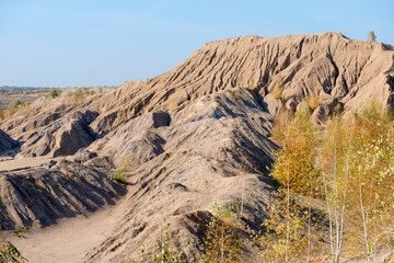 Konduki, Tula region, Romancevskie mountains, Abandoned Ushakov quarries. The mud erosion of the soil looks like mountains. The area is overgrown with young birches. Beautiful natural landscape