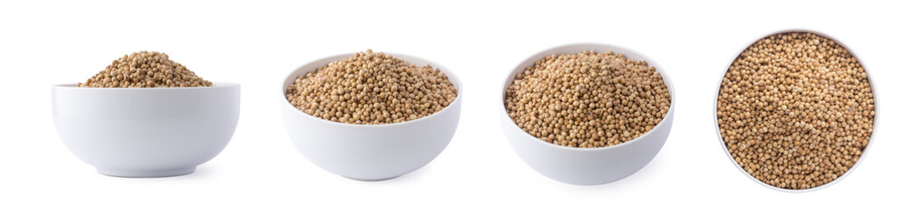 set of dried coriander seeds in a bowl, also known as chinese parsley, dhania or cilantro, traditional culinary spice isolated on white background, taken in different angles