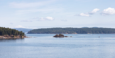 Canadian Nature Landscape and Homes on the Island on West Coast of Pacific Ocean. Sunny Summer. Piers Island near Victoria, Vancouver Island, BC, Canada.