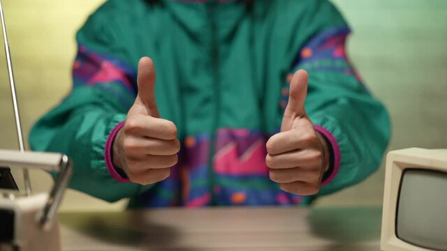 80s 90s Retro Giving two Thumbs Up to the Camera