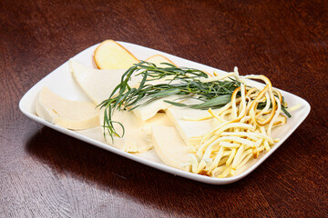 Caucasian tradition cheese plate served herbs