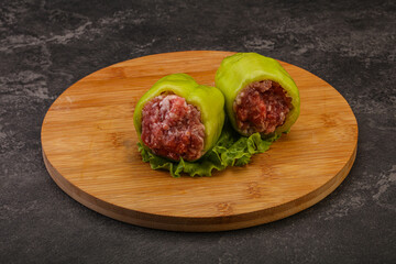 Raw stuffed pepper for cooking
