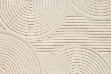 Pattern in Japanese Zen Garden with concentric circles on sand for meditation and tranquility