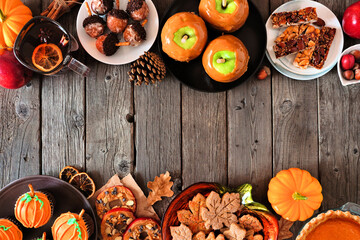 Fall desserts double border. Table scene with an assortment of sweet fall treats. Top view over a...