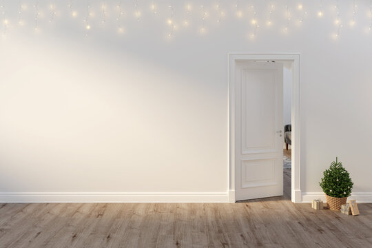 Modern room with a glowing garland on the blank white wall with an open door, a small Christmas tree in a wicker basket next to wrapped gifts on a wooden floor. Front view. 3d render