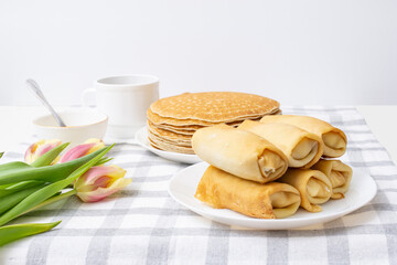breakfast with pancakes, Russian pancakes stuffed with cottage cheese, stack of pancakes with syrup