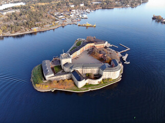 Aerial shot of the Vaxholm Fortress Museum surrounded by the sea in Sweden