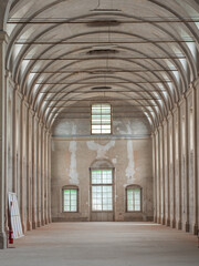 Empty White Interiors without People in an old Hospital Building in Parma, Italy