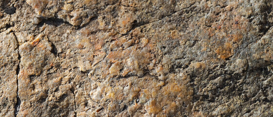 Granite stone surface texture. Texture of rough granit stone surface background. Abstract background from natural material