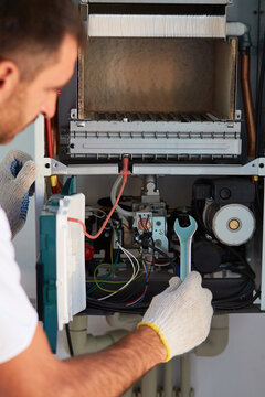 Customer service for the repair and adjustment of the gas boiler. Gas heater maintenance, automation adjustment