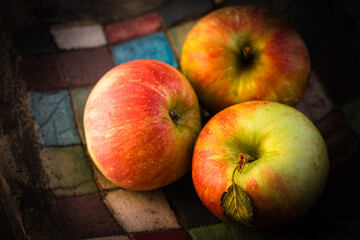 still life with three apples