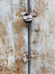 old rusty metal door texture with locks 