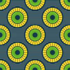 Seamless african fashion vector pattern with circles, round shapes. Bright, vibrant colors. Striped background. Color illustration.
