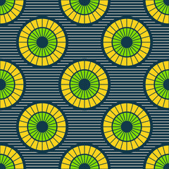 Seamless african fashion vector pattern with circles, round shapes. Bright, vibrant colors. Striped background. Color illustration.