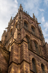 Fototapeta na wymiar Tower of the colonial church named Saint Andrew United Church in Montreal, Canada
