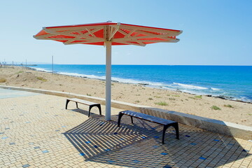 beach chairs and umbrella