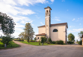 Fototapeta na wymiar Ancient church in the middle of nowwhere, countryside Lombardy, Italy