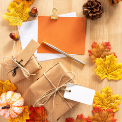 Naklejka na ściany i meble Composite image of happy thanksgiving with gifts, greeting and pen.