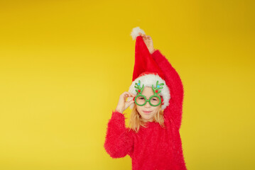 girl in a Santa costume for the new year