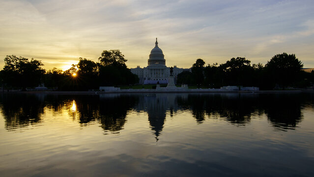 The US Capitol Reflecting Pool at Sunrise in the Covid 19 Pandemic Wide Shot