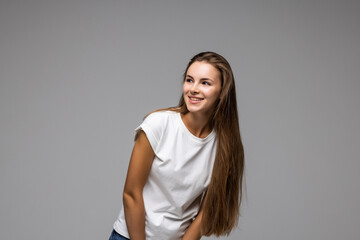 Obraz premium Beautiful young woman isolated on grey background