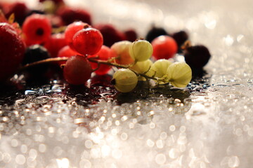 red currants on a black background