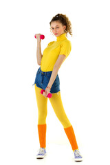 Sporty girl doing sport exercise with red dumbbell