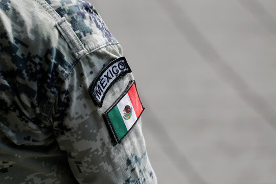 The Mexican flag is seen on the uniform of an army soldier during a parade celebrating the Mexico's Independence Day in Mexico City, Mexico.