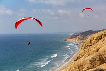 Paragliders over the Ocean
