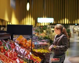 Woman buying vegetables at the market