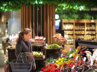 Woman buying vegetables at the market