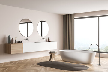 Modern beige panoramic bathroom with two round mirrors. Corner view.