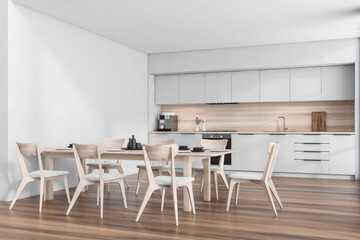 Corner view on kitchen room interior with wooden floor