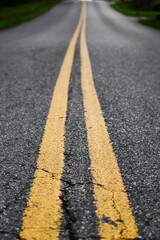 Obraz premium yellow lines on asphalt