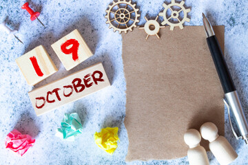 October 19th. Hello October, Cube wooden calendar showing date on 19 October