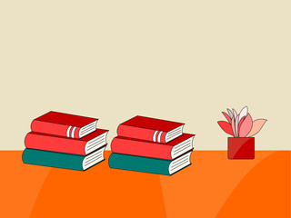 Red books on an orange desk