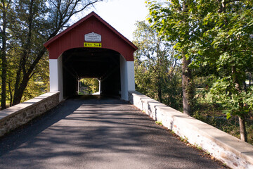 KNECHT'S COVERED BRIDGE IN BUCKS COUNTY, PENNSYLVANIA. BUILT IN 1873. NATIONAL REGISTER OF HISTORIC PLACES.  CROSSES COOKS CREEK. 110ft long 15ft wide.