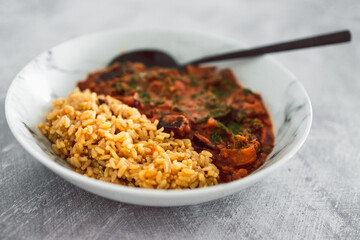 vegan eggplant lentil curry with brown rice, healthy plant-based food