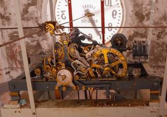 handcrafted antique bell tower clock mechanism from the 19th century that moves 4 clocks, one for each face